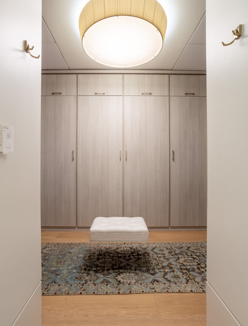 HOBI- Primary Bedroom Custom His & Hers closet with lit hanging bars and shelves