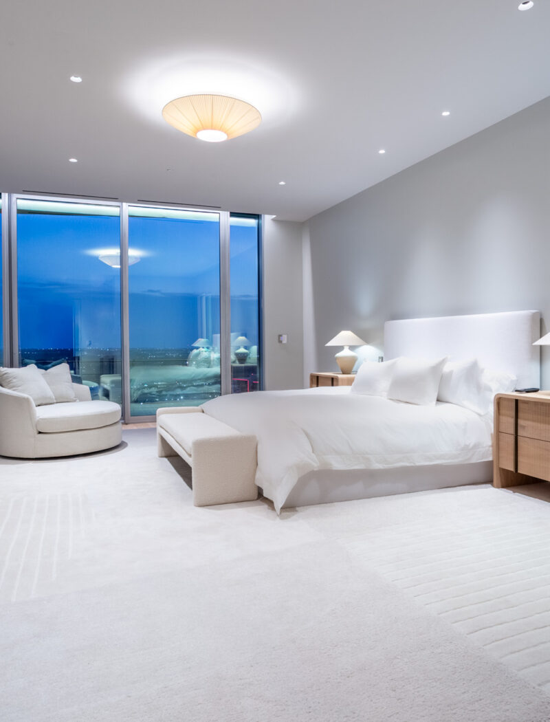 HOBI-Primary Bedroom with custom TV cabinet and city view